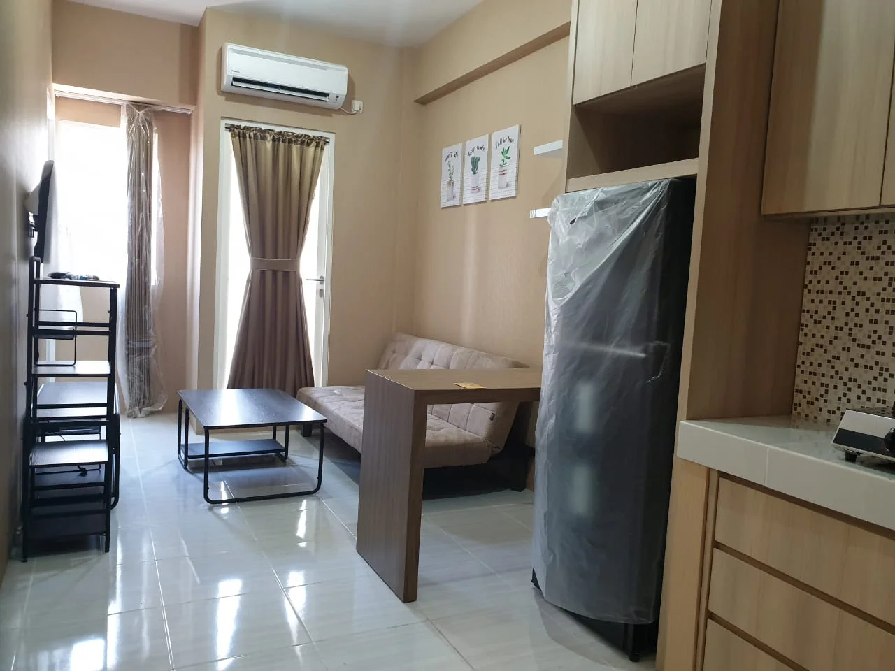 Disewakan Unit Apartemen Puncak Dharmahusada Siap Huni di Surabaya Timur - Image 1