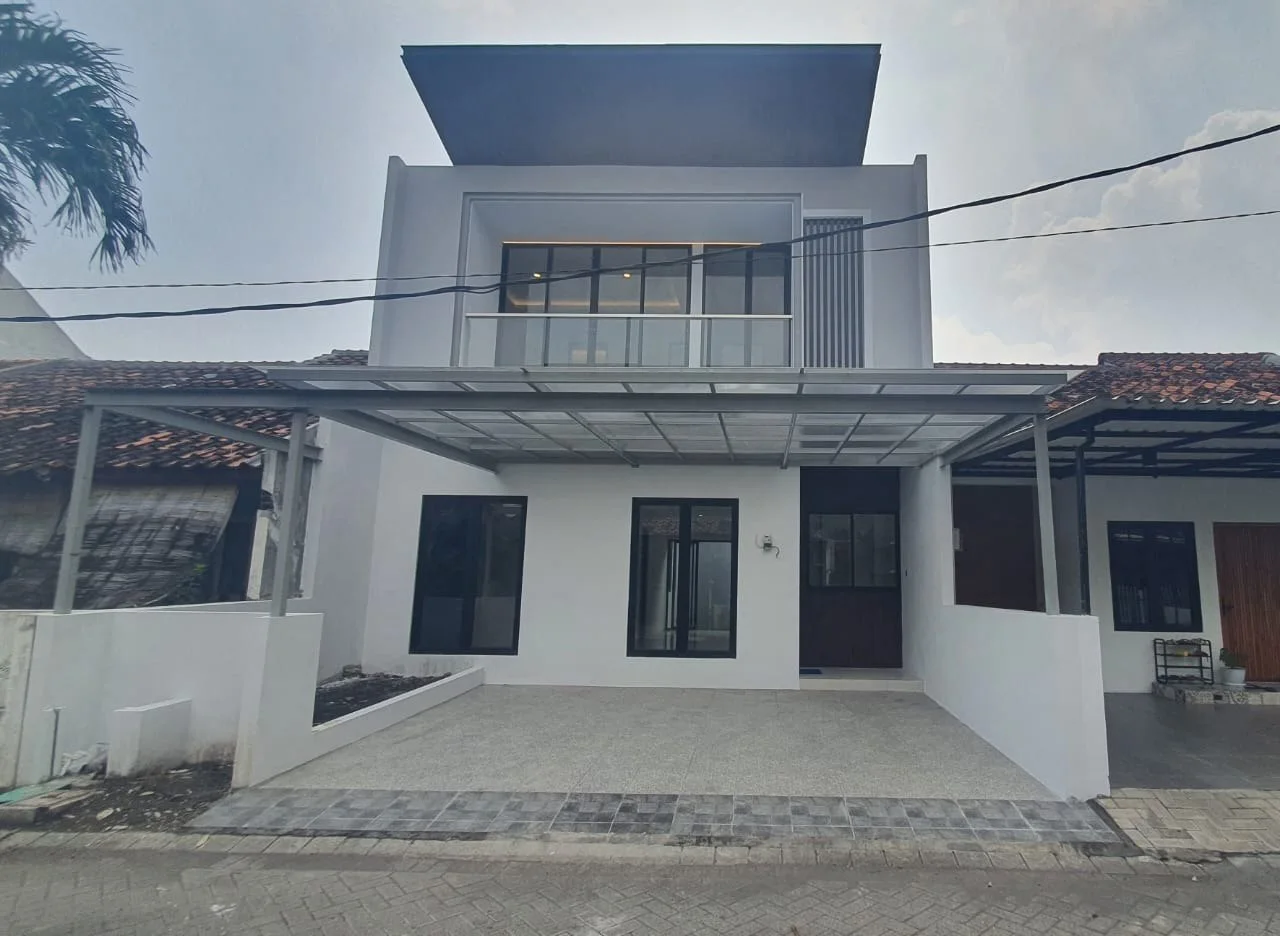 Dijual Rumah Modern Minimalis Kondisi New Gres di Kawasan Bukit Palma, Citraland Utara Surabaya Barat - Image 1