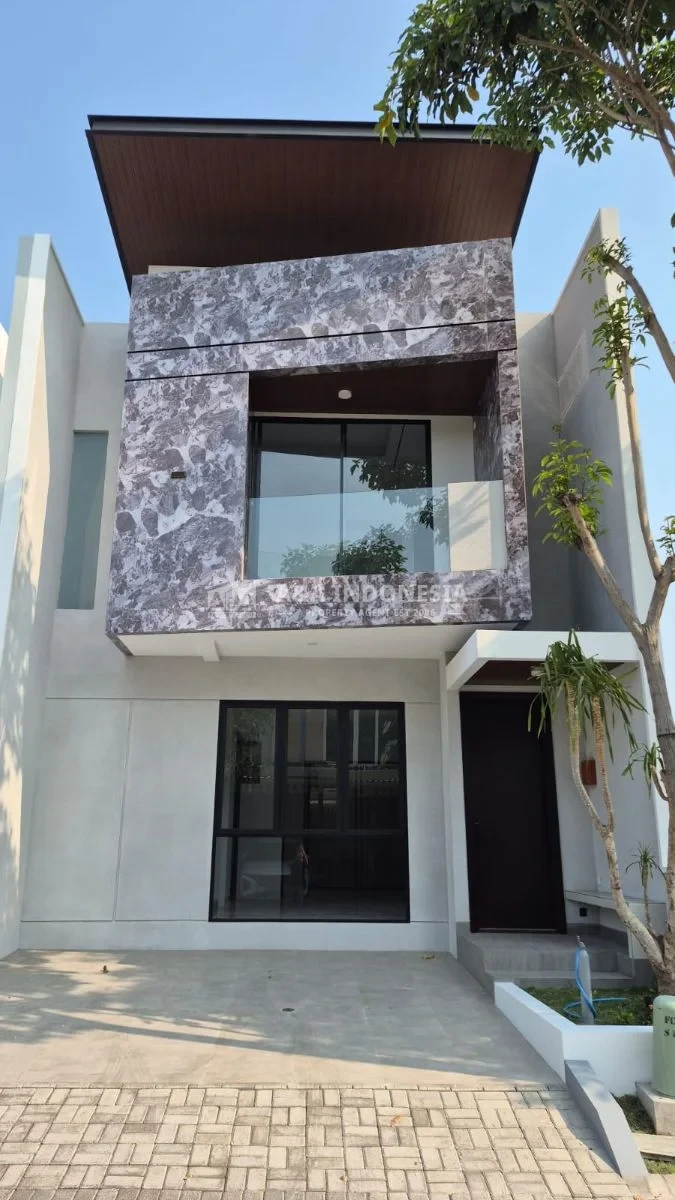 Dijual rumah minimalis modern di kawasan hunian Taman Puspa Raya Citraland surabaya barat
