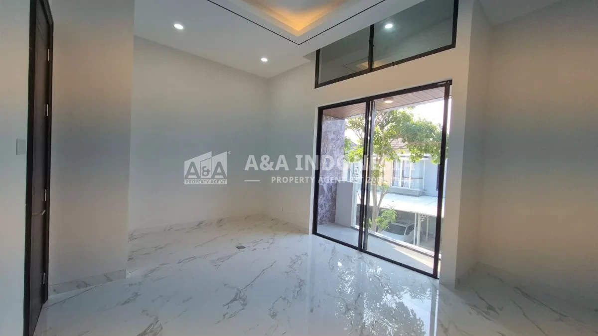 Dijual rumah minimalis modern di kawasan hunian Taman Puspa Raya Citraland surabaya barat - Thumbnail 2